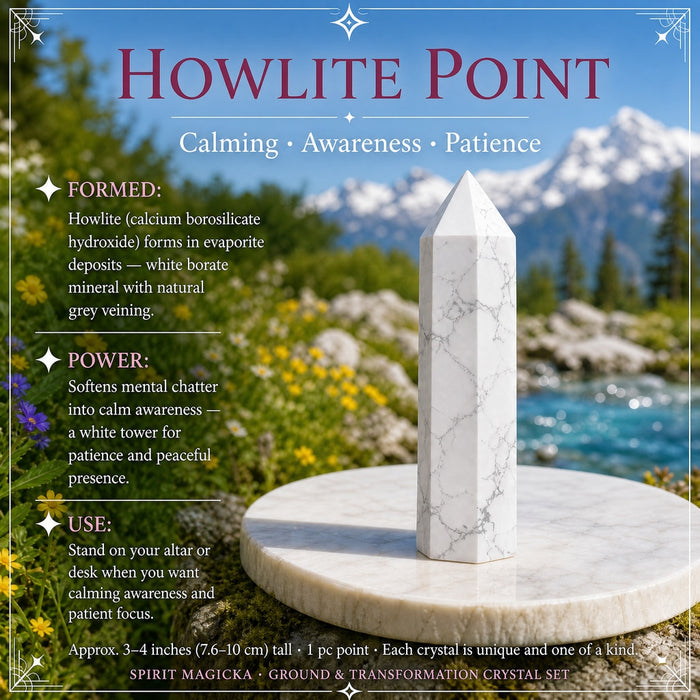 White howlite point with grey veining on a marble dish