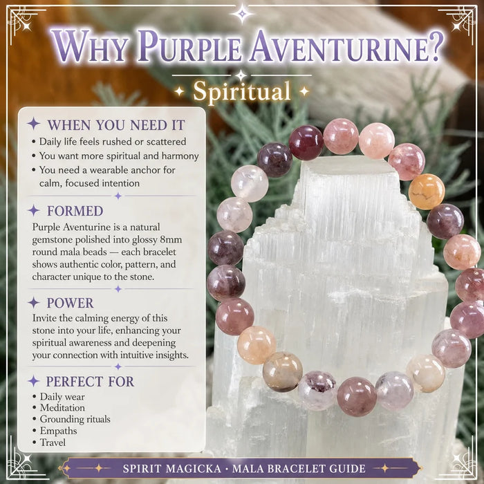 Purple aventurine mala bracelet of round lavender and plum beads displayed on a white selenite stand