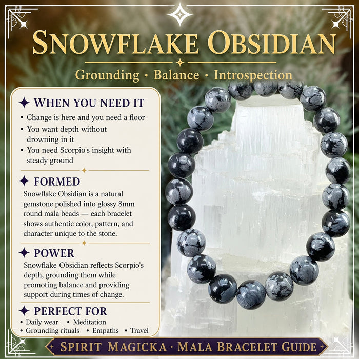 Snowflake obsidian bead bracelet in black beads with grey-white flakes on a selenite block