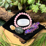 Conjunto de bolsa de tranquilidade com pulseira de quartzo rosa Mala