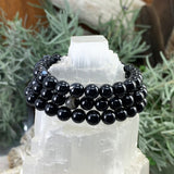 Mala Black Agate-armbånd med fløyelsveske