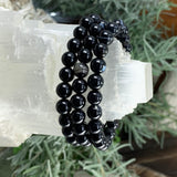 Mala Black Agate-armbånd med fløyelsveske