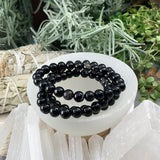 Mala Black Agate-armbånd med fløyelsveske