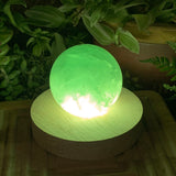 Luce d'atmosfera in cristallo (sfera di fluorite verde media)