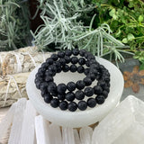 Pulseira Mala Lava Stone com bolsa de veludo