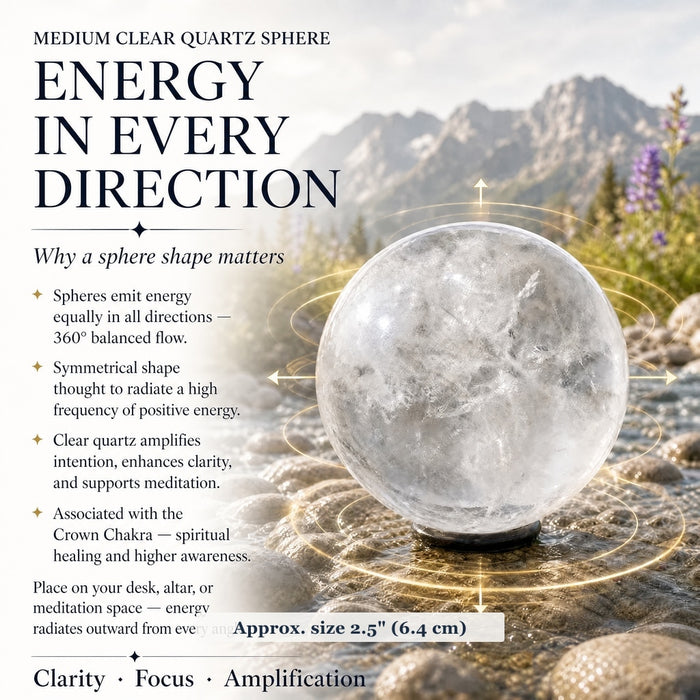 Medium clear quartz sphere on a black stand beside a mountain stream