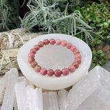 Mala Pink Rhodonite armbånd med fløjlspose