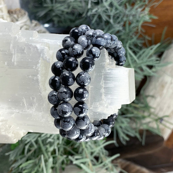 Mala Snowflake Obsidian armbånd med fløjlpose