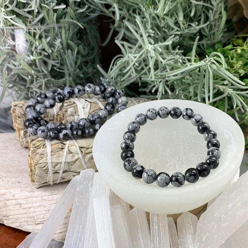 Mala Snowflake Obsidian-armbånd med fløyelsveske