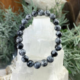 Pulseira de obsidiana Mala Snowflake com bolsa de veludo