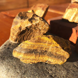 Working On Tiger’s Eye Rough Stone - rawstone