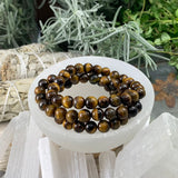 Pulsera Mala Ojo De Tigre Con Bolsita De Terciopelo